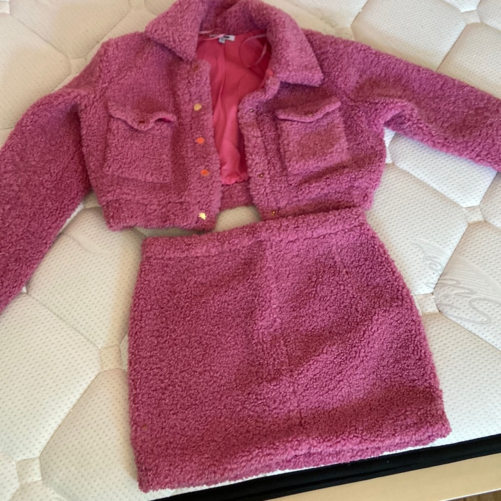 This two piece set is from fashion nova. It’s a dark pink color.